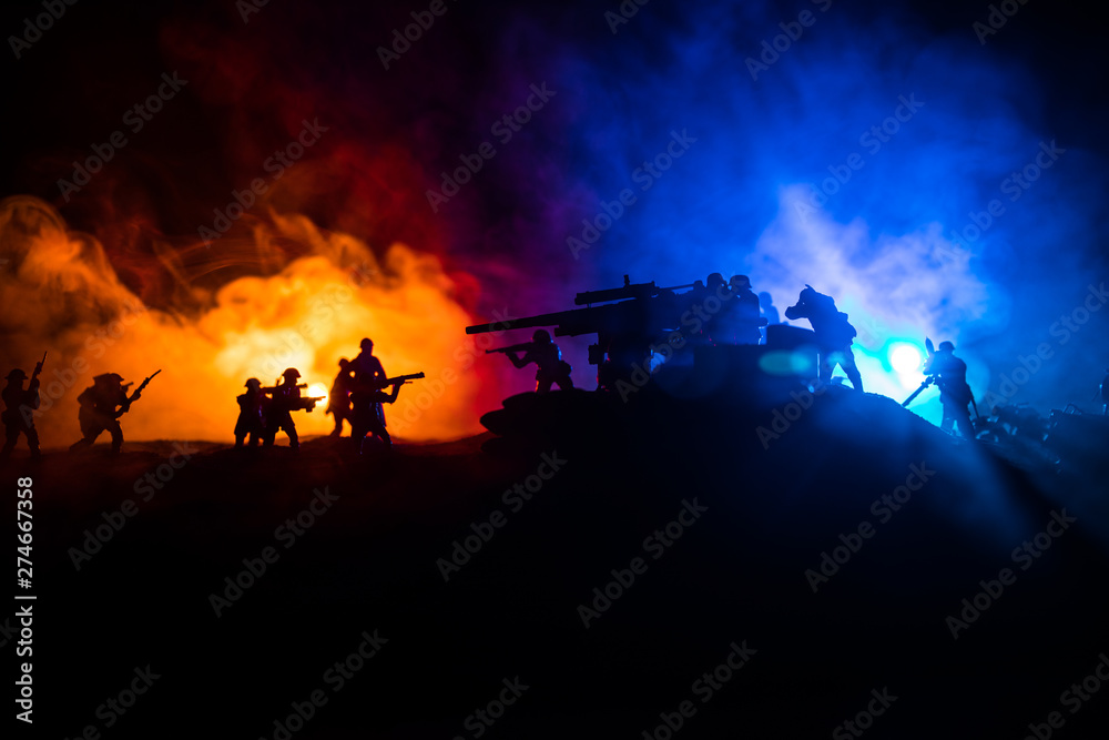 Fototapeta premium War Concept. Military silhouettes fighting scene on war fog sky background,