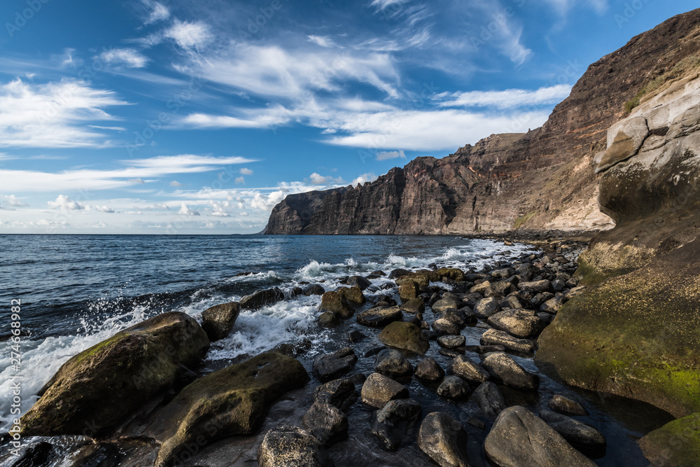 Lagoon with black stones on the island of Tenerife Lagoon with black stones on the island of Tenerife