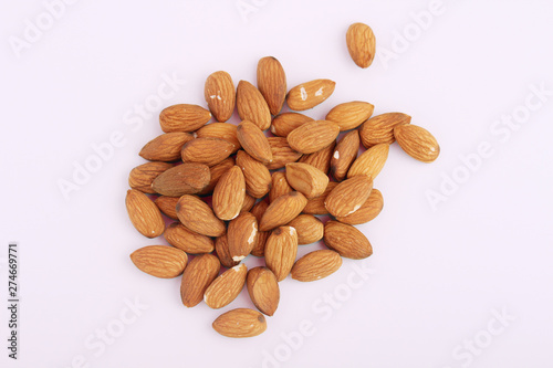 Pile of almond at white background