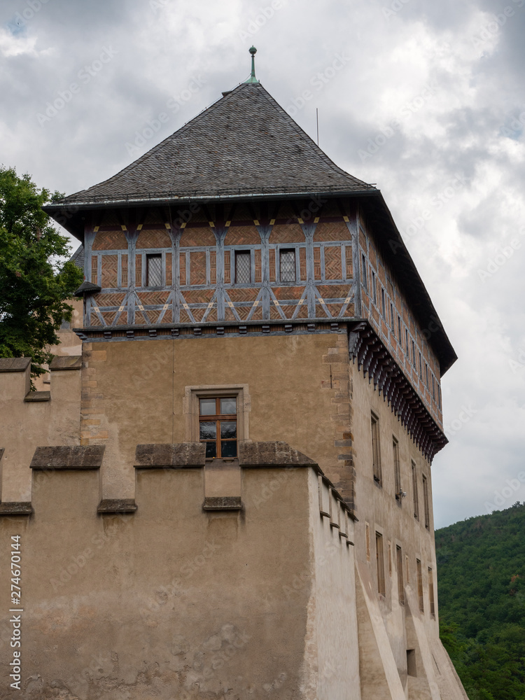 Burgrave's House at Karlstejn Castle. A gothic, medieval half timbered house perched over the walls of the royal castle in Bohemia, Czach Republic.