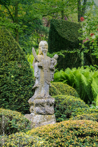 Ancient Chinese guardian statue in the park - Arcen  Netherlands