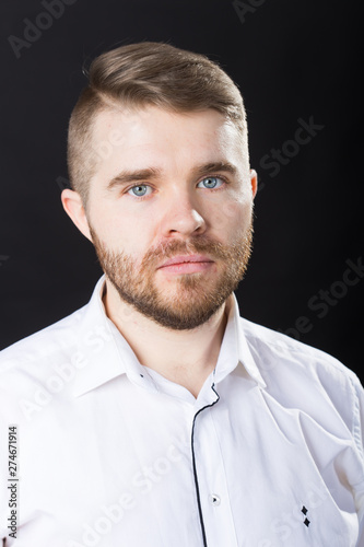 Portrait, guy and business people concept - Handsome serious man in white shirt looking at camera