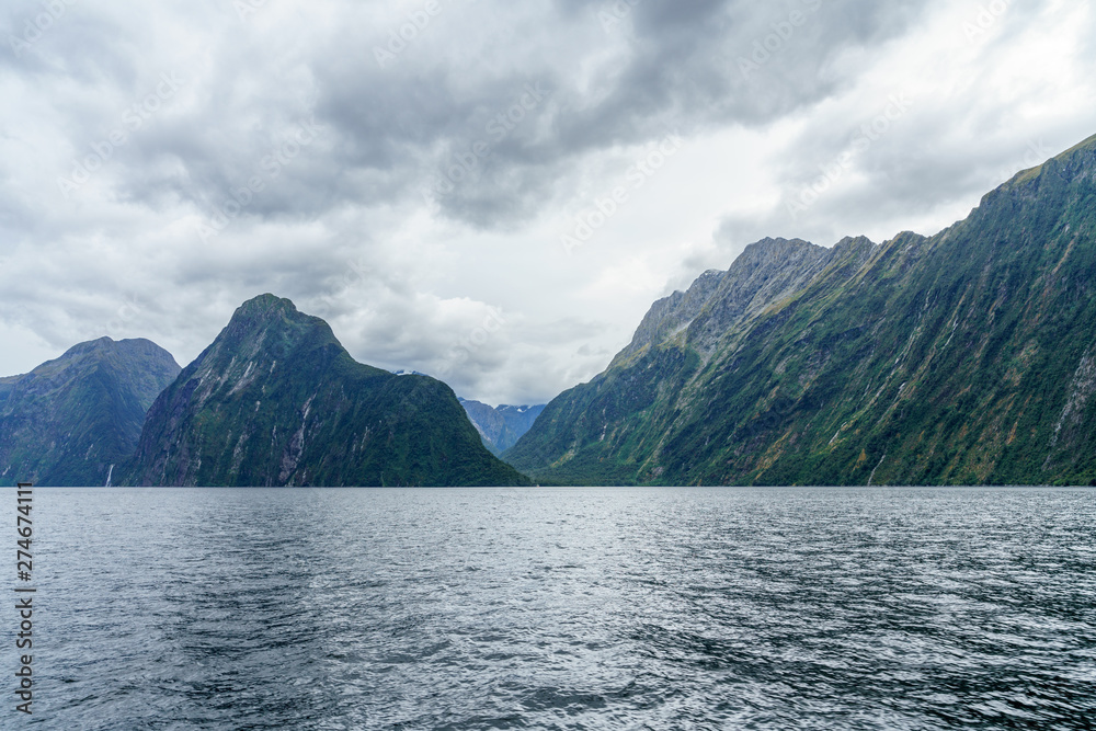 steep coast in the mountains at milford sound, fjordland, new zealand 15