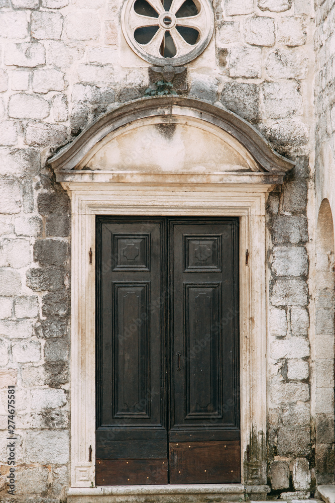  Cozy corners of Montenegro. Panorama of the city of Kotor and the details of the streets.