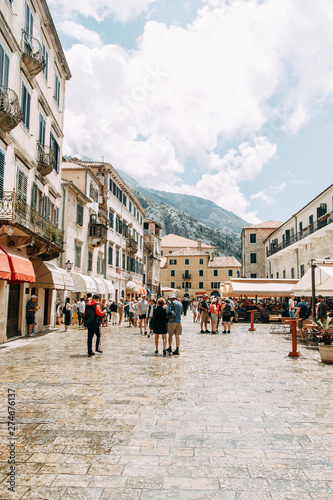  Cozy corners of Montenegro. Panorama of the city of Kotor and the details of the streets. © pavelvozmischev