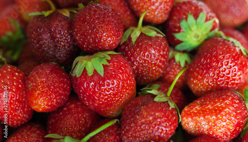 Background from freshly harvested strawberries. Top view