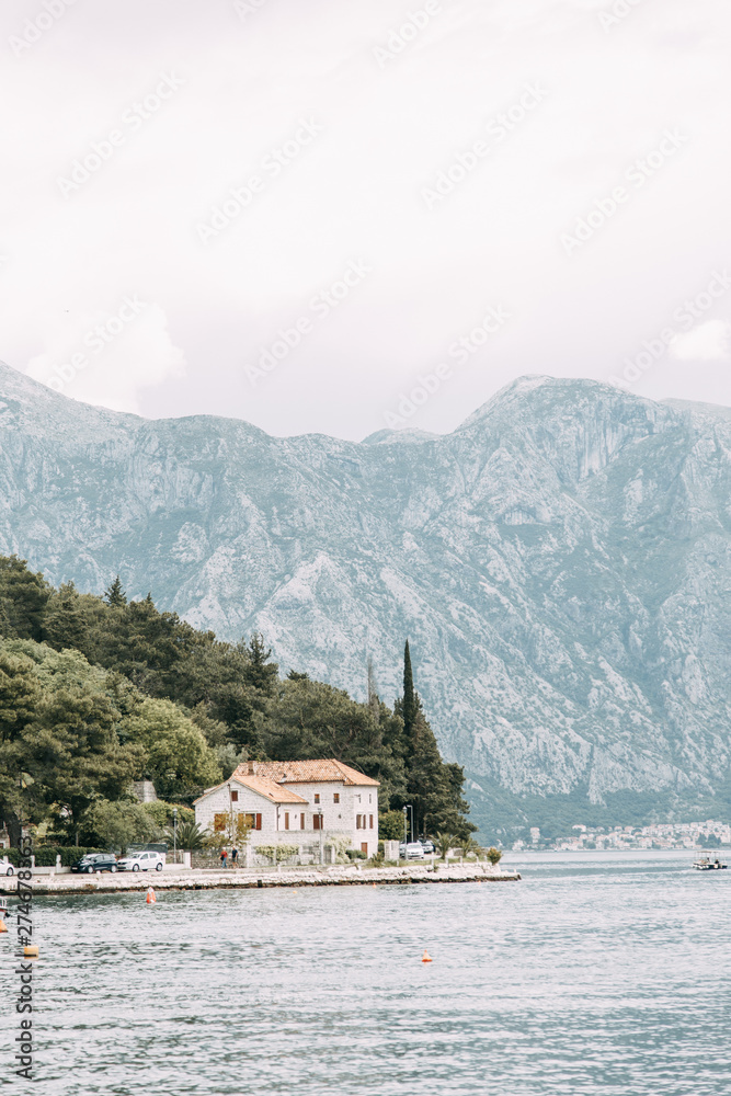  Streets and sights of the old town. Panorama of the city of Perast in Montenegro.