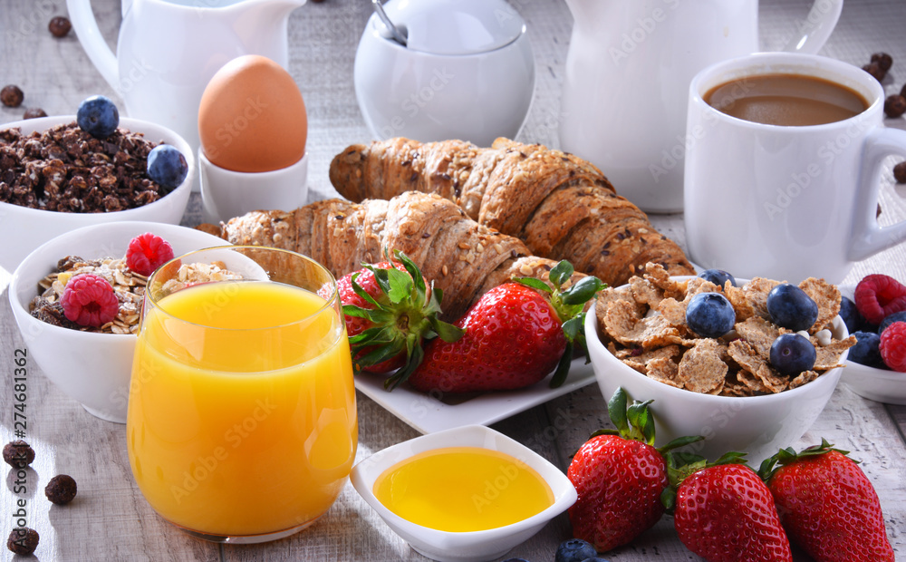 Breakfast served with coffee, juice, croissants and fruits Breakfast served with coffee, juice, croissants and fruits