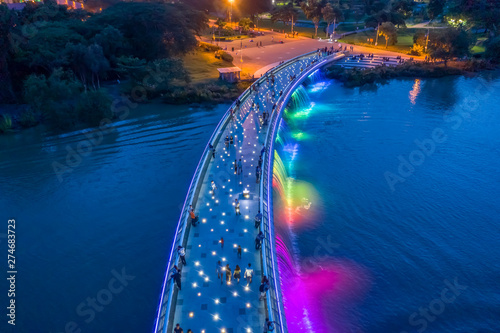 The Anh Sao (Starlight) Bridge is located in the heart of the international commercial and financial district of Phu My Hung. It is the first modern pedestrian bridge of Ho Chi Minh City in Vietnam photo
