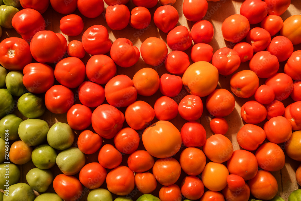 group of fresh tomatoes. red cherry tomatoes closeup top view. small tomatoes harvest group of fresh tomatoes. red cherry tomatoes closeup top view. small tomatoes harvest