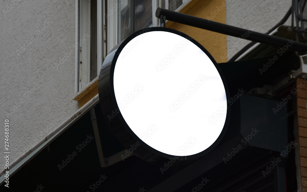 Empty white circle and blank square shop signboard layout. Lightbox attached to the wall on the street. Model. 3d render mockup signboard
