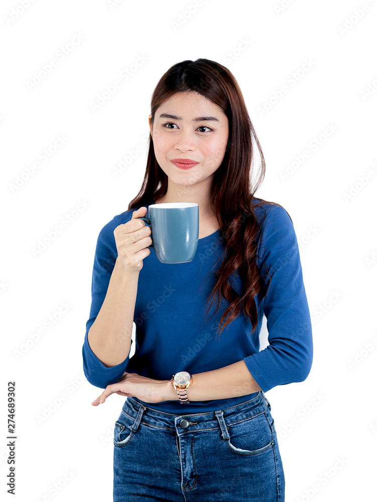 Happy Asian woman wearing blue sweater holding coffee mug in white background. Happy Asian woman wearing blue sweater holding coffee mug in white background.