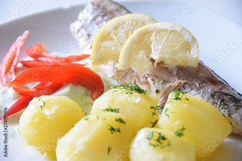 boiled and potato fillet with fish and red peppers