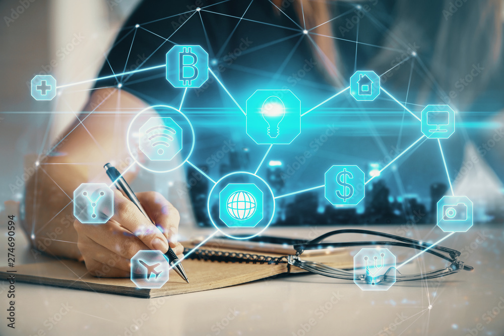 Social network theme hologram over hands taking notes background. Concept of global international people connect. Double exposure Social network theme hologram over hands taking notes background. Concept of global international people connect. Double exposure