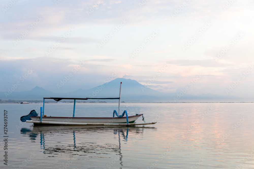 Batur Volcano eruption with boat view in Bali island, Indonesia