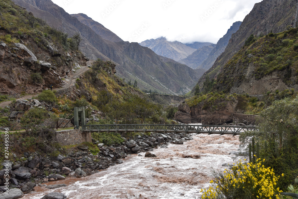 Bridge across the Urubamba river at the start point of the Inca Trail to Machu Picchu. Cusco, Peru
