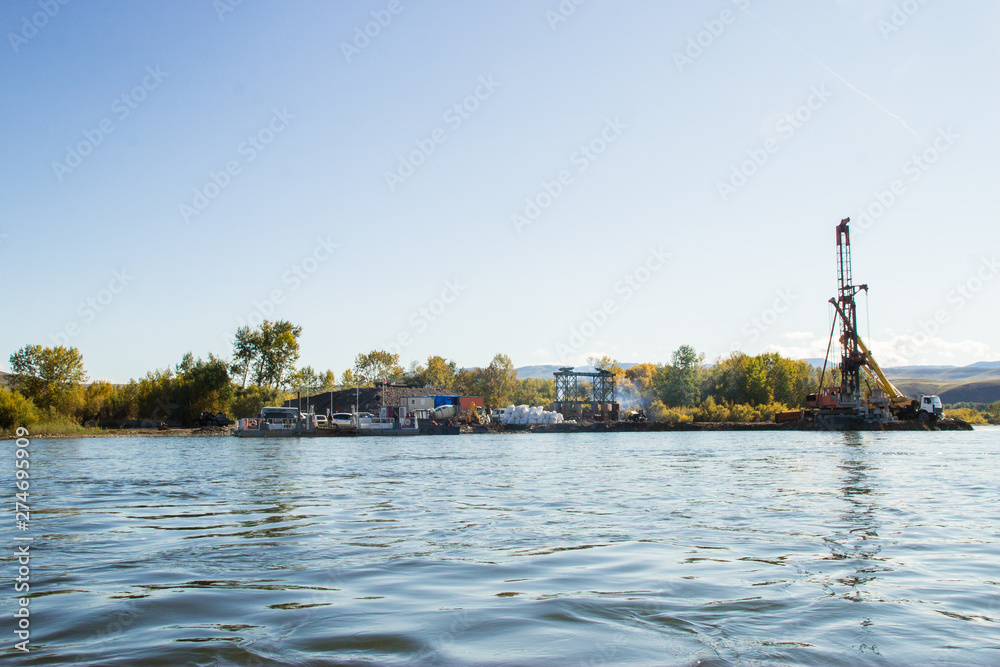 The river and the sky are beautiful. nature in Russia. Morning on the river Bank in the village. bright colorful lovely sunrise outdoors. Trees on the river Bank. Lake with reflection on the water. The river and the sky are beautiful. nature in Russia. Morning on the river Bank in the village. bright colorful lovely sunrise outdoors. Trees on the river Bank. Lake with reflection on the water.
