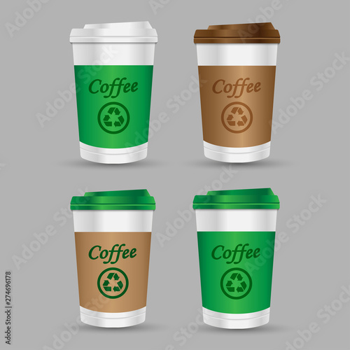 Set of realistic coffee cups with a recycle sign on a gray background