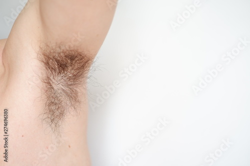 Close up armpit with long hair isolated background
