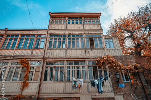 01/05/2019 Tbilisi, Georgia, an old Georgian court with lots of clothes that dry on the ropes photo