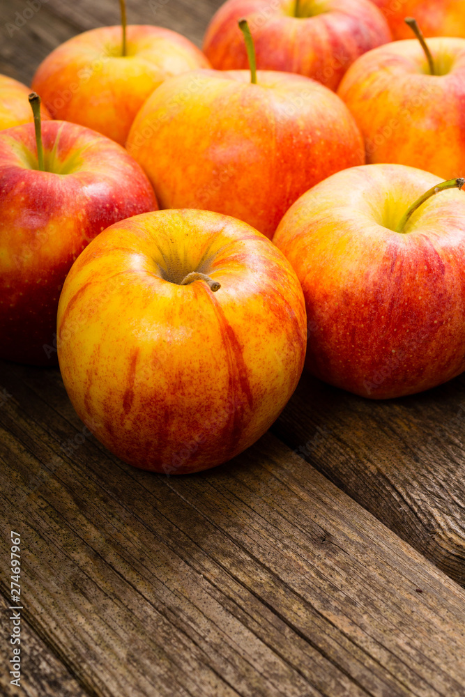 apple fruits in a row, old weathered wood table background apple fruits in a row, old weathered wood table background