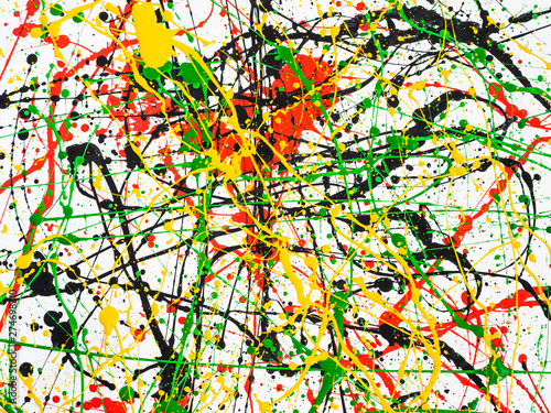 Art splashed spilled yellow green red black paint. expressionism.