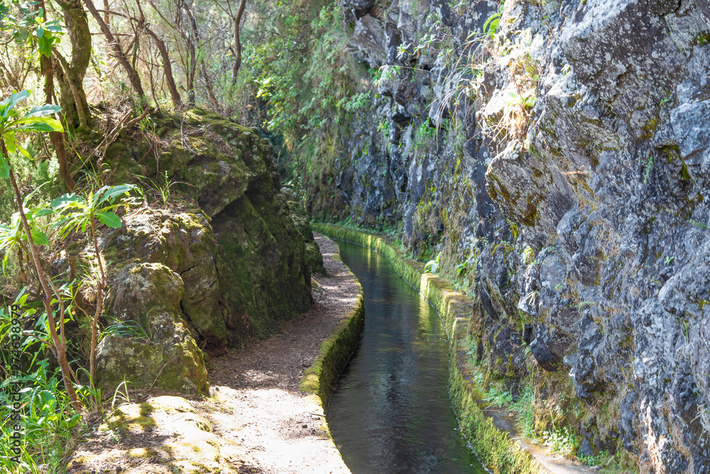 Levada do Norte near Miradouro on the island of Madeira. Leavdas are irrigation channels specific to the island. Levada do Norte near Miradouro on the island of Madeira. Leavdas are irrigation channels specific to the island.