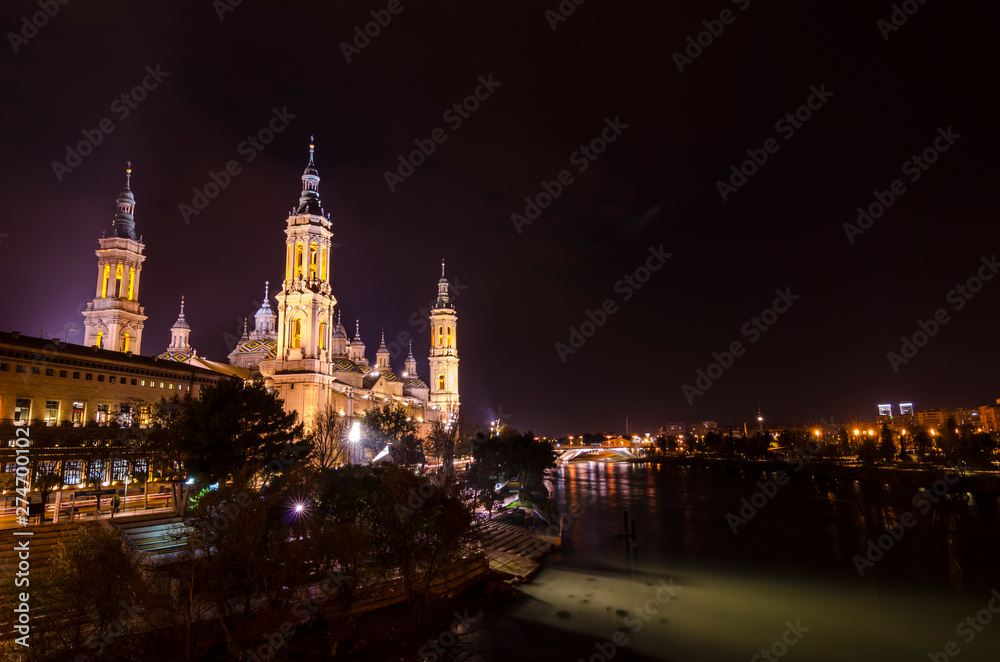 Night view of the Basilica of Our Lady of the Pillar, Zaragoza, Spain.