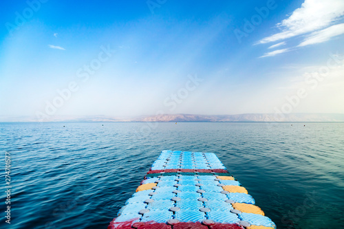 Fototapeta View of the sea of Galilee (Lake Tiberias, Kinneret or Kinnereth), Pontoon Pier on the water