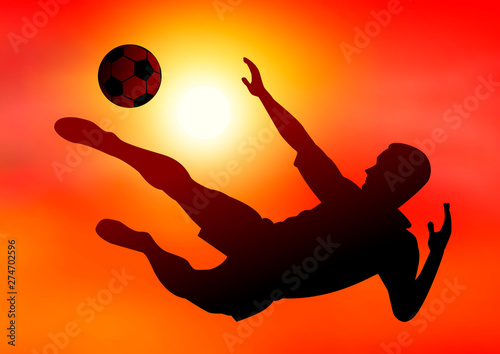Soccer player on sunset background. Silhouette of a football player with the ball on the background of the sunset. Footballer kicks the ball. Active athlete with the ball