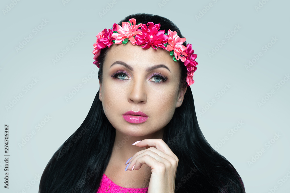 Fototapeta premium Face Fashion model touching her chin, stylish crimson trendy make up