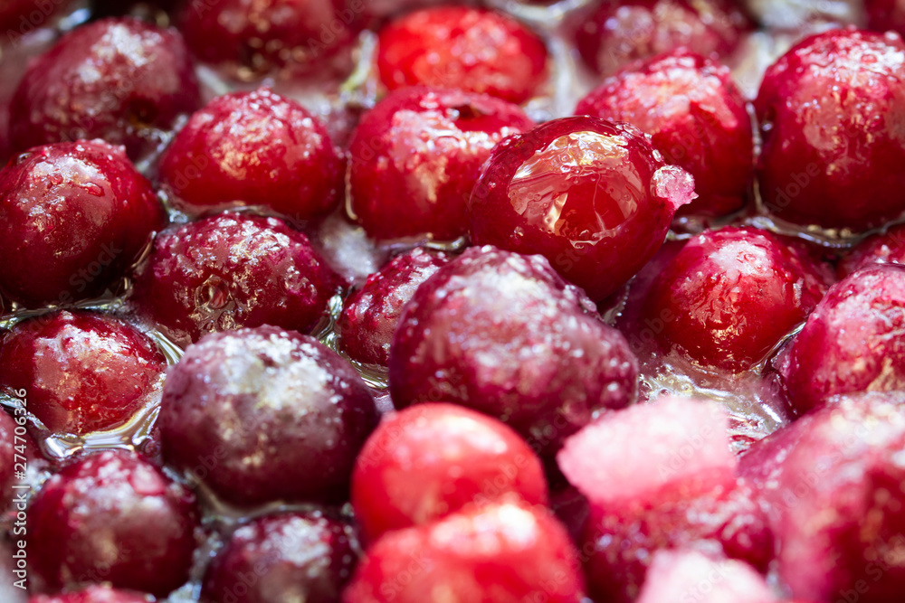 sour candied cherry cooking . Cherry jam as a background close up, macro shot . sour candied cherry cooking . Cherry jam as a background close up, macro shot .
