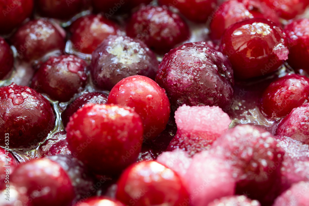 sour candied cherry cooking . Cherry jam as a background close up, macro shot . sour candied cherry cooking . Cherry jam as a background close up, macro shot .