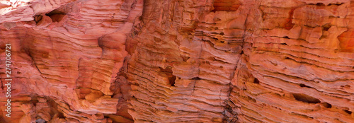 Coloured Canyon is a rock formation on South Sinai (Egypt) peninsula. Desert rocks of multicolored sandstone background. 
