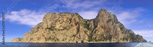 Landscapes of the island of Capri from the sea.View of the coastline with the rocky shores and sea caves.