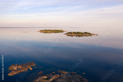 Beautiful view of the islands of the Gulf of Finland in the summer evening bird's-eye view. Calm good weather © Mikhail