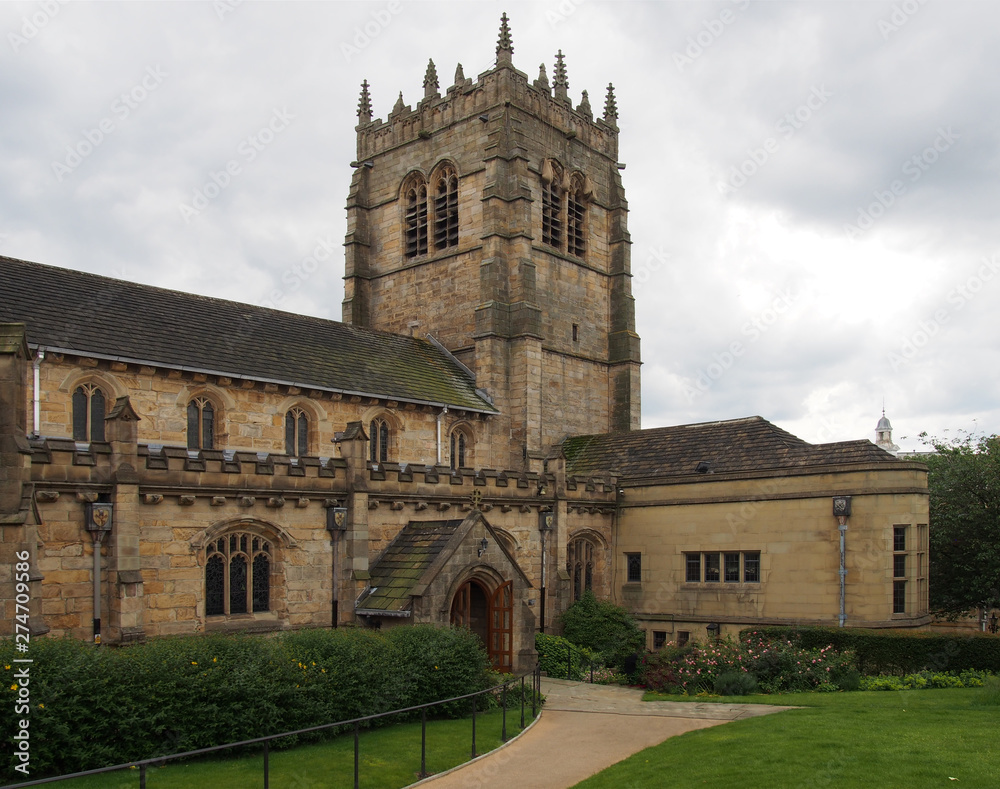 a view of the tower and main entrance of the cathedral church of saint peter in bradford west yorkshire
