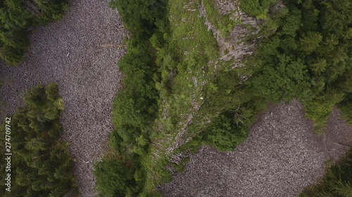 Aerial reveal of basalt columns mountain formation photo