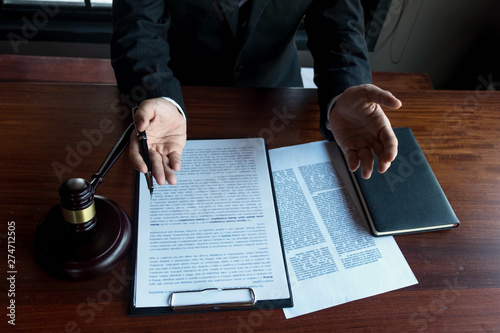 Lawyer working on the table in office. consultant lawyer, attorney, court judge, concept.