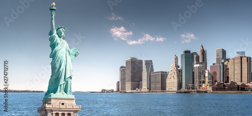 The statue of Liberty, Landmarks of New York City with Manhattan skyscraper background