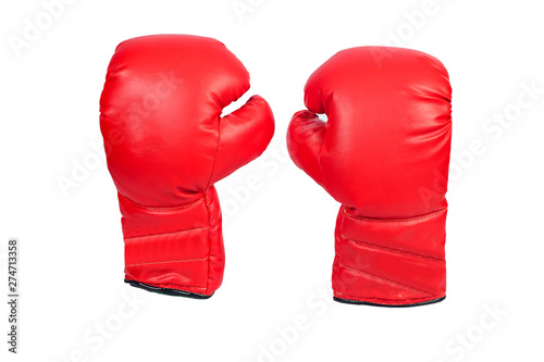 Pair of red leather boxing gloves or mitt isolated on white background. © amnarj2006