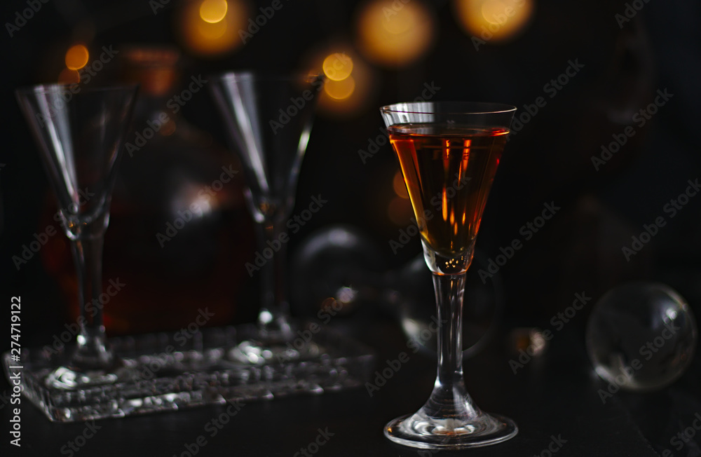 Fototapeta premium tincture, quince liquor in a glass