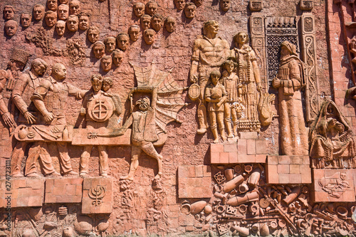 Detail of the Soviet-era relief on wall of city market in Kutaisi, Georgia