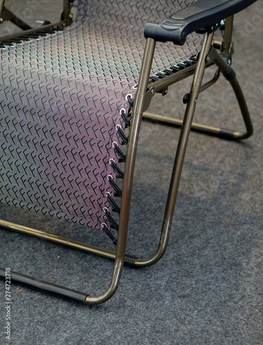 Closeup of fold able metallic easy and relaxing chair  