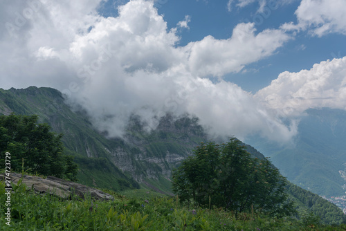 Nature, mountain landscape, picturesque view with cloudy sky.