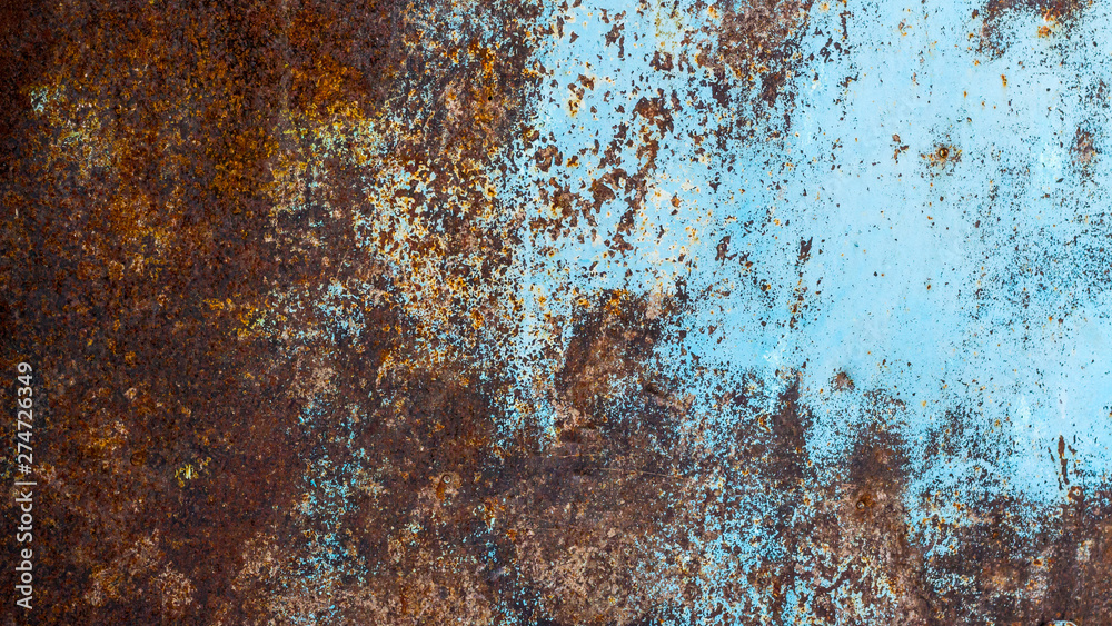 Rusty metallic texture. Oxidation of the metal. Grunge, steampunk, rock, vintage. Iron background, brown, red and blue. Rusty metallic texture. Oxidation of the metal. Grunge, steampunk, rock, vintage. Iron background, brown, red and blue.
