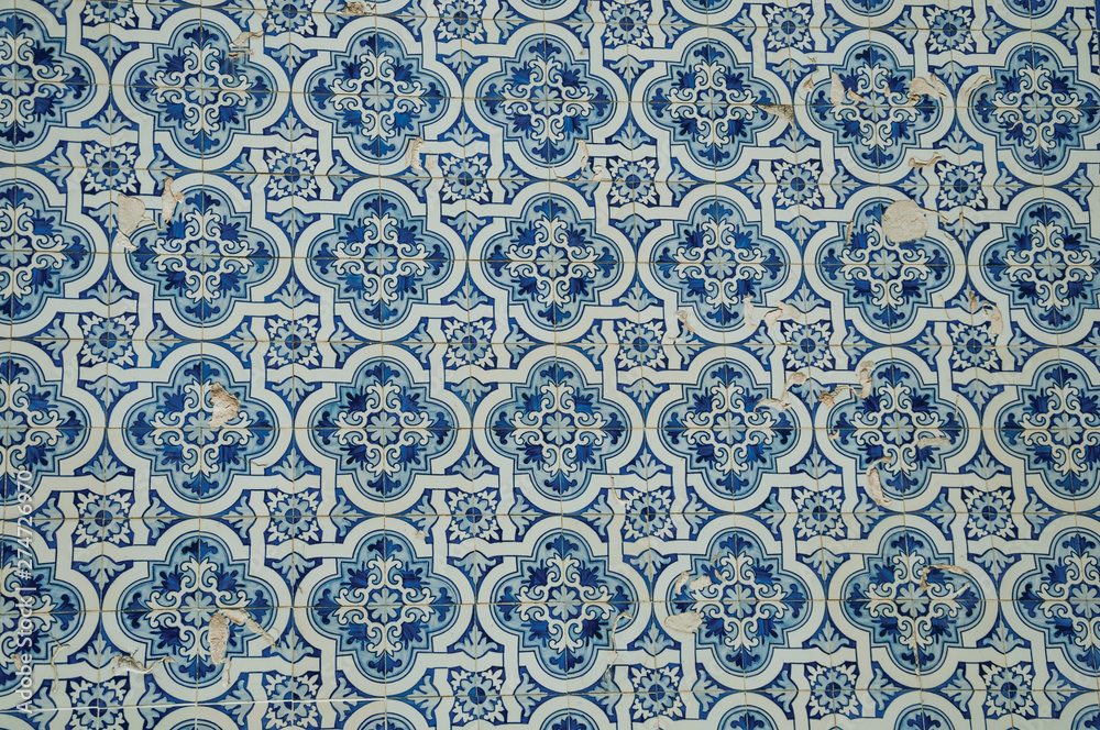 Blue floral pattern hand-painted in baroque style on ceramic tiles