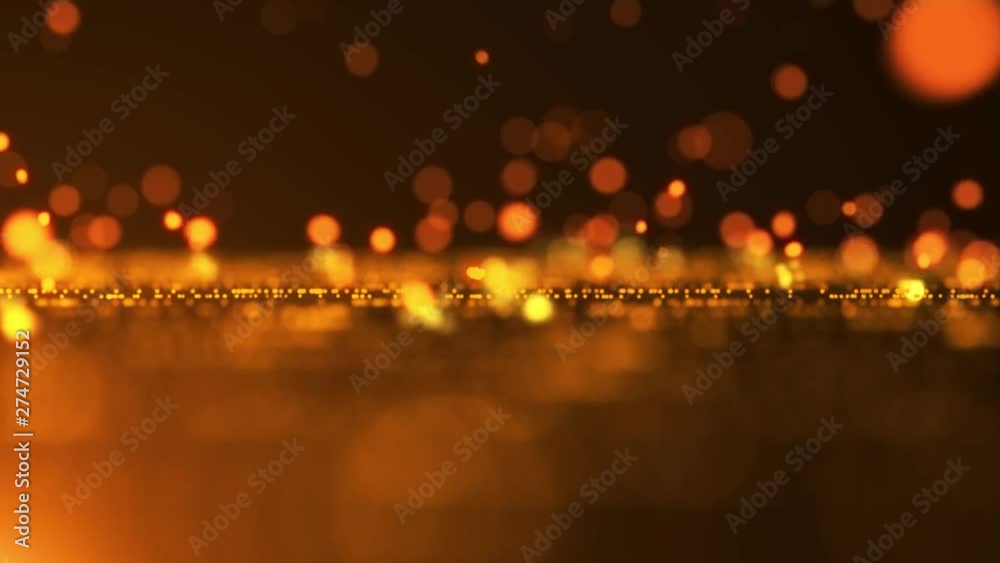 The abstract background of gold has light, sparkling and particles. Starburst with seamless golden light
