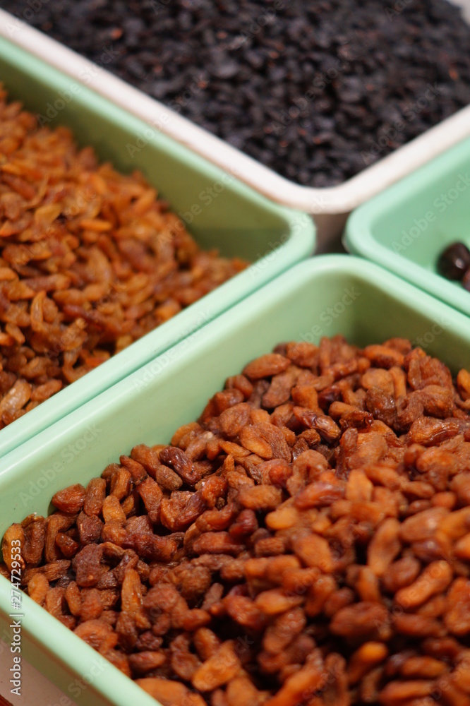 Indian assorted dry fruits in display in a retail shop Indian assorted dry fruits in display in a retail shop