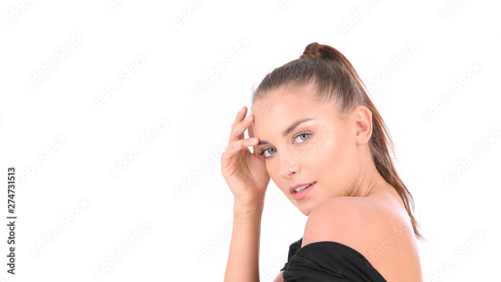 Beauty concept. A charming woman is fondling her face on a white background. Beauty concept. A charming woman is fondling her face on a white background.